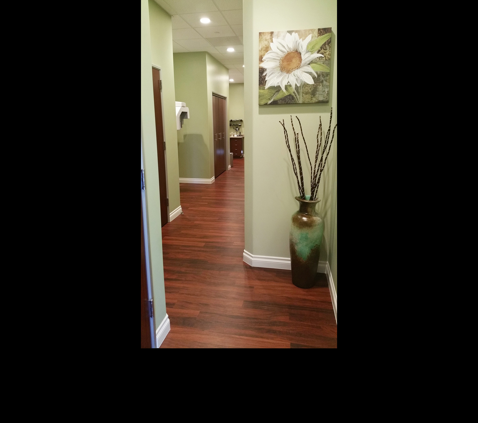 
		When you are ready for your treatment, you will enter through the glass door from the lobby to find our private hallway to your designated room.